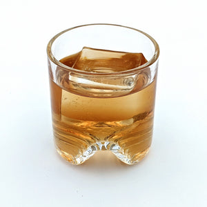 hand-blown glass tumbler with large clear ice cube made from the OnTheRocks IceBox